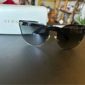 Gently used Versace silver trim sunglasses.